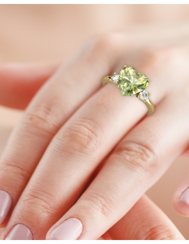 ANILLO GAIA DE ORO Y TOPACIO CON OLIVINA...