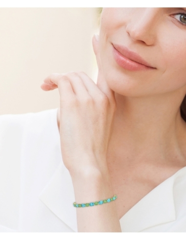 PULSERA FALLS ORO TOPACIO AZUL Y PERIDOTO